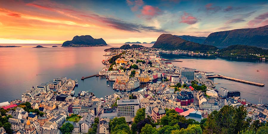 A colourful sunset sky over the vibrant town of Ålesund.